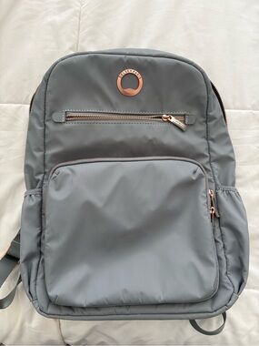 Delsey Paris Women's Gray Backpack with Rose Gold Accents